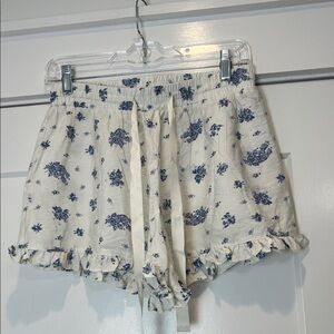 Threads of Luxx Blue Floral Women's Shorts with ruffled edge size medium.